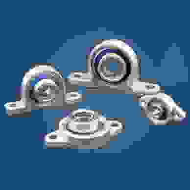  Four mini stainless steel bearings with closed and open covers on blue background