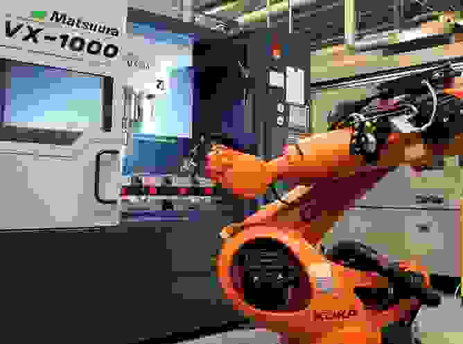Matsuura VX-1000 vertical machining center with robot
