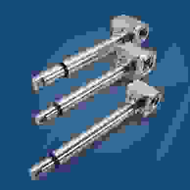 Three stainless steel actuators on blue background