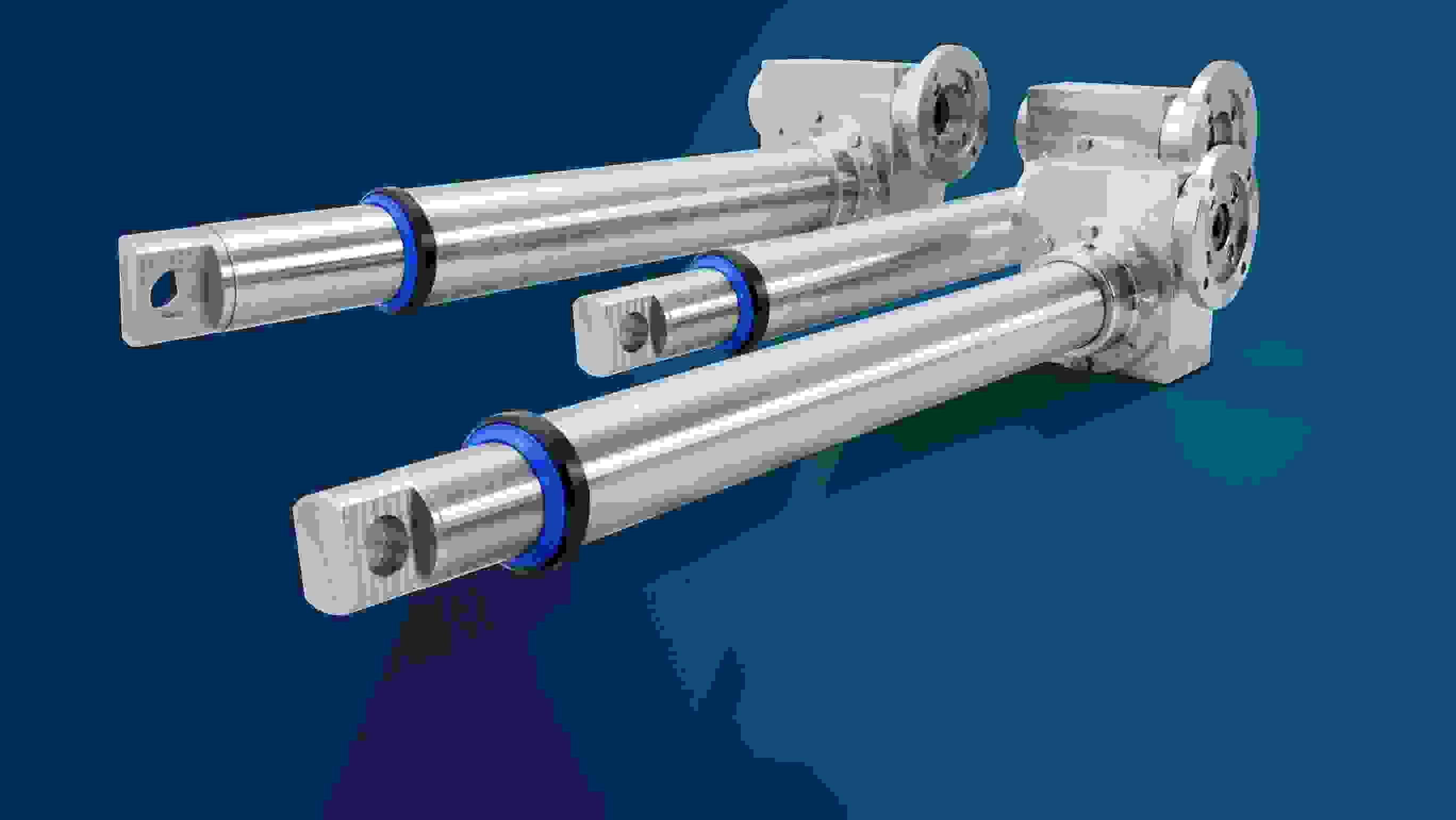 Two stainless steel actuators on blue background 