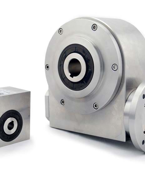 Two stainless steel gearboxes on white background 