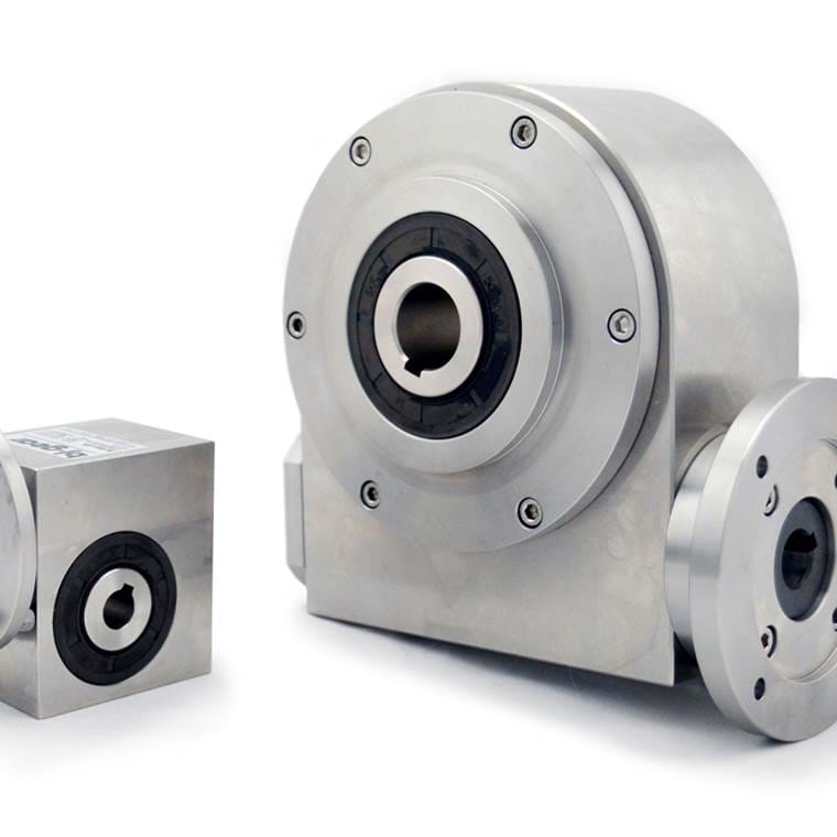 Two stainless steel gearboxes on white background 