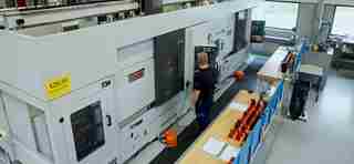 Employee at CNC machining centres